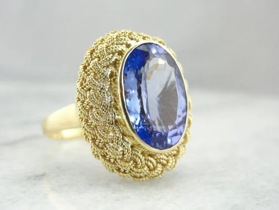 Malachite Gemstone Rings in 14K Gold with a Carved Stone for a Unique and Artistic AppealTanzanite in Modernist Style Cocktail Ring