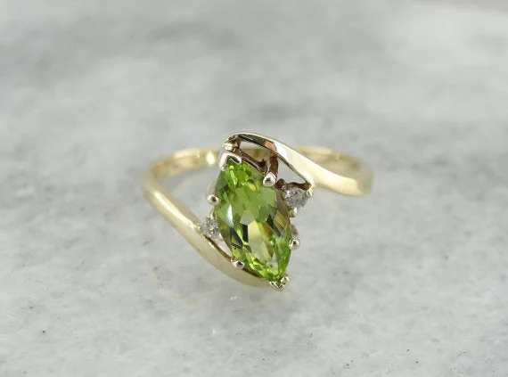 Citrine Gemstone Rings in Stainless Steel with a Stackable Design for a Trendy Everyday WearMarquise Peridot Cocktail Ring in Modern Bypass Style Mounting