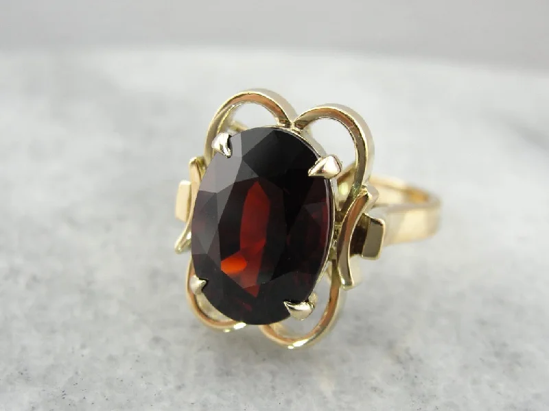 Aquamarine Gemstone Rings in 9K Gold with a Bezel Setting for a Modern and Secure FitVintage Pyrope Garnet Statement Ring in Yellow Gold