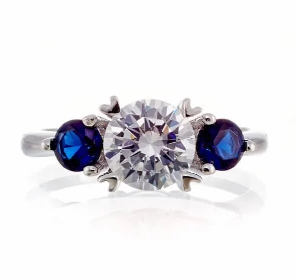 Men's Tanzanite Engagement Rings in Palladium with a Three - Stone ArrangementRound and Sapphire Blue Accent Cubic Zirconia Engagement Ring - White Gold Plated Sterling Silver