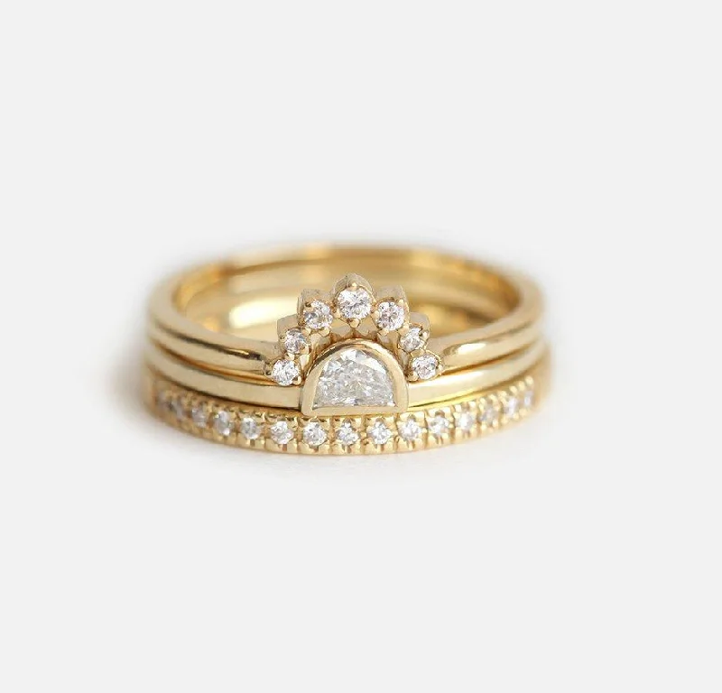 Two - Tone Gold and Silver Wedding Bands with a Twist Design for a Contemporary and Eye - Catching StyleSunset diamond ring set