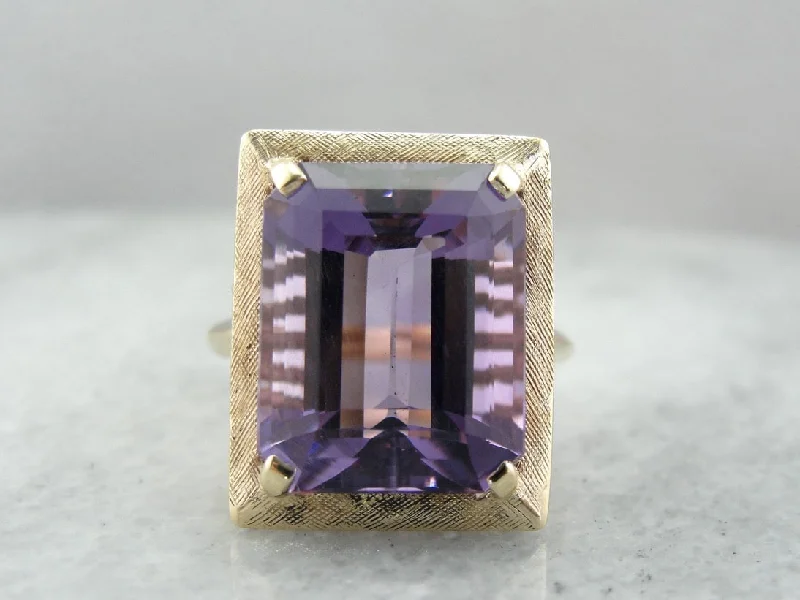 Aquamarine Gemstone Rings in 9K Gold with a Bezel Setting for a Modern and Secure Fit1970's Amethyst Cocktail Ring with Perfect Brushed Finish, Yellow Gold Frame