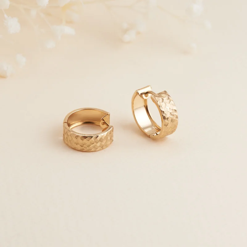 Two - Tone Gold and Silver Wedding Bands with a Twist Design for a Contemporary and Eye - Catching Style9K Yellow Gold Patterned Round Huggie Earrings