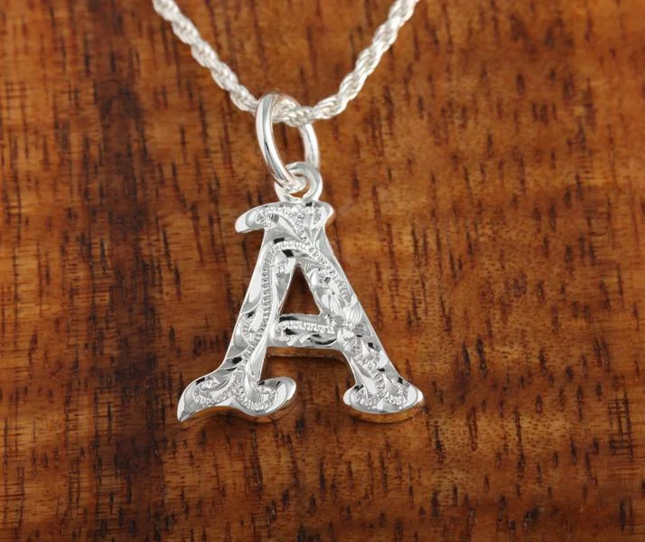 Zodiac sign pendants for astrology loversSterling Silver Hawaiian Scroll Initial Pendant (L) (Chain Sold Separately)