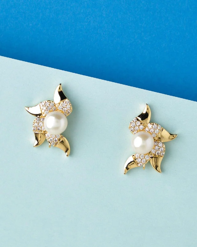 Two - tone drop earrings with a combination of metalsBold Dawnbreakers Pearl Studded Earring