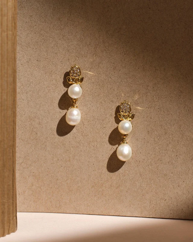 Crystal - adorned drop earrings for a glamorous lookCelestial Bloom Pearl Earrings