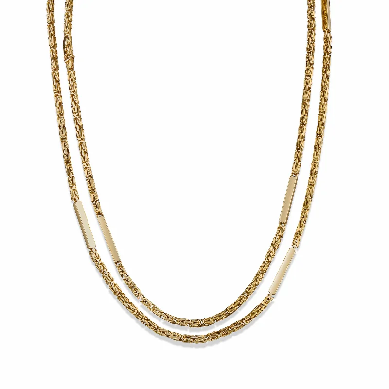 Chunky Chain Rings with a Celtic Knotwork PatternChaumet Paris 18K Gold Long Chain Necklace