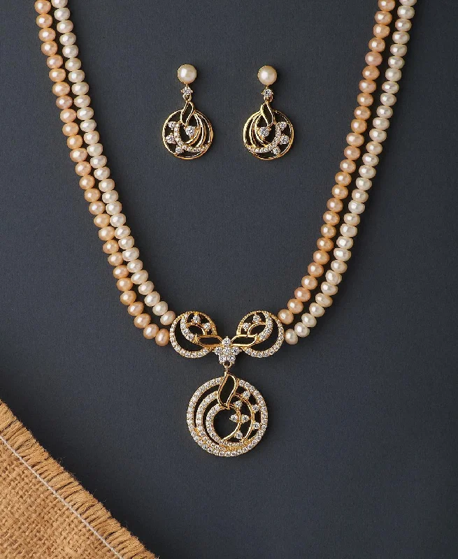 Animal - Motif Chain Rings with a Lion or Eagle DesignRavishing Pearl Necklace Set