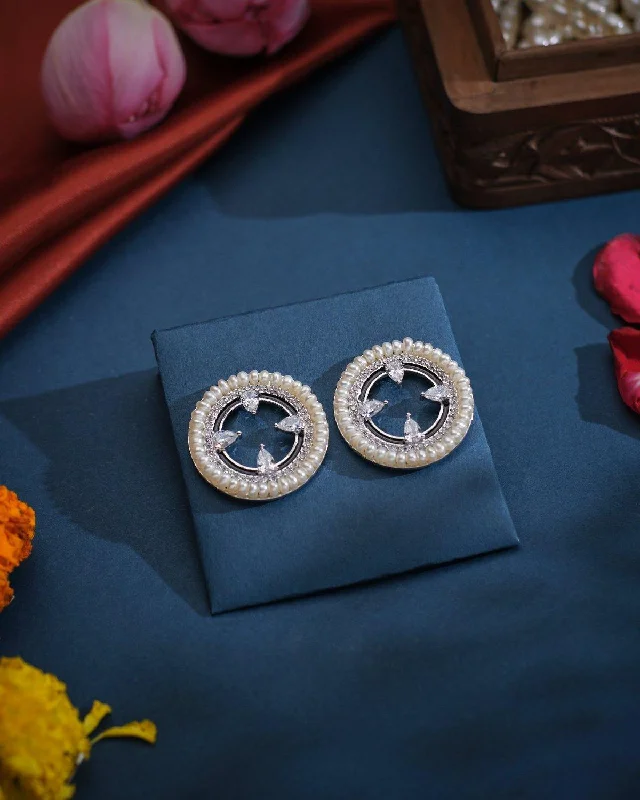 Sapphire drop earrings with a regal blue hueThe Cordial Stud Earrings