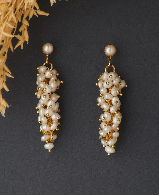 Silver drop earrings with intricate filigree workTrendy Banjara Pearl Earring