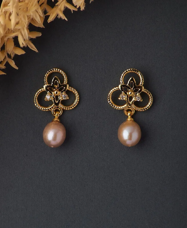 Sparkly drop earrings with a high - shine finishTrendy Pearl Stud Earring