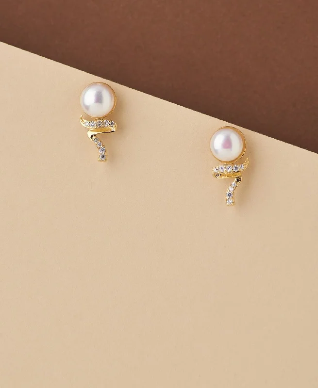 Retro - style drop earrings from the 1960s or 1970sTrendy White Pearl Stud Earring